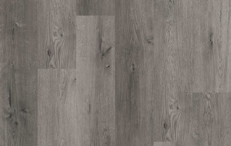 Grey-toned wooden floor with varied plank widths and grain patterns.