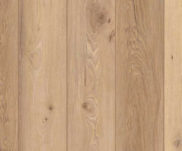 Close-up of light brown wooden floor planks withVisible grain patterns and knots