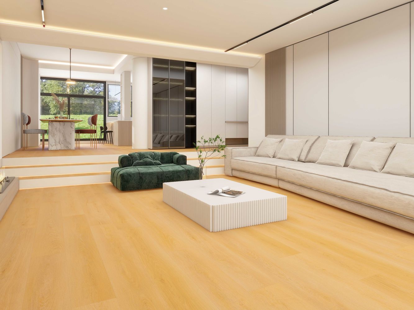 Bright open living area with a long cream sofa, a green tufted ottoman, and a ribbed white coffee table; dining area and large windows in back.