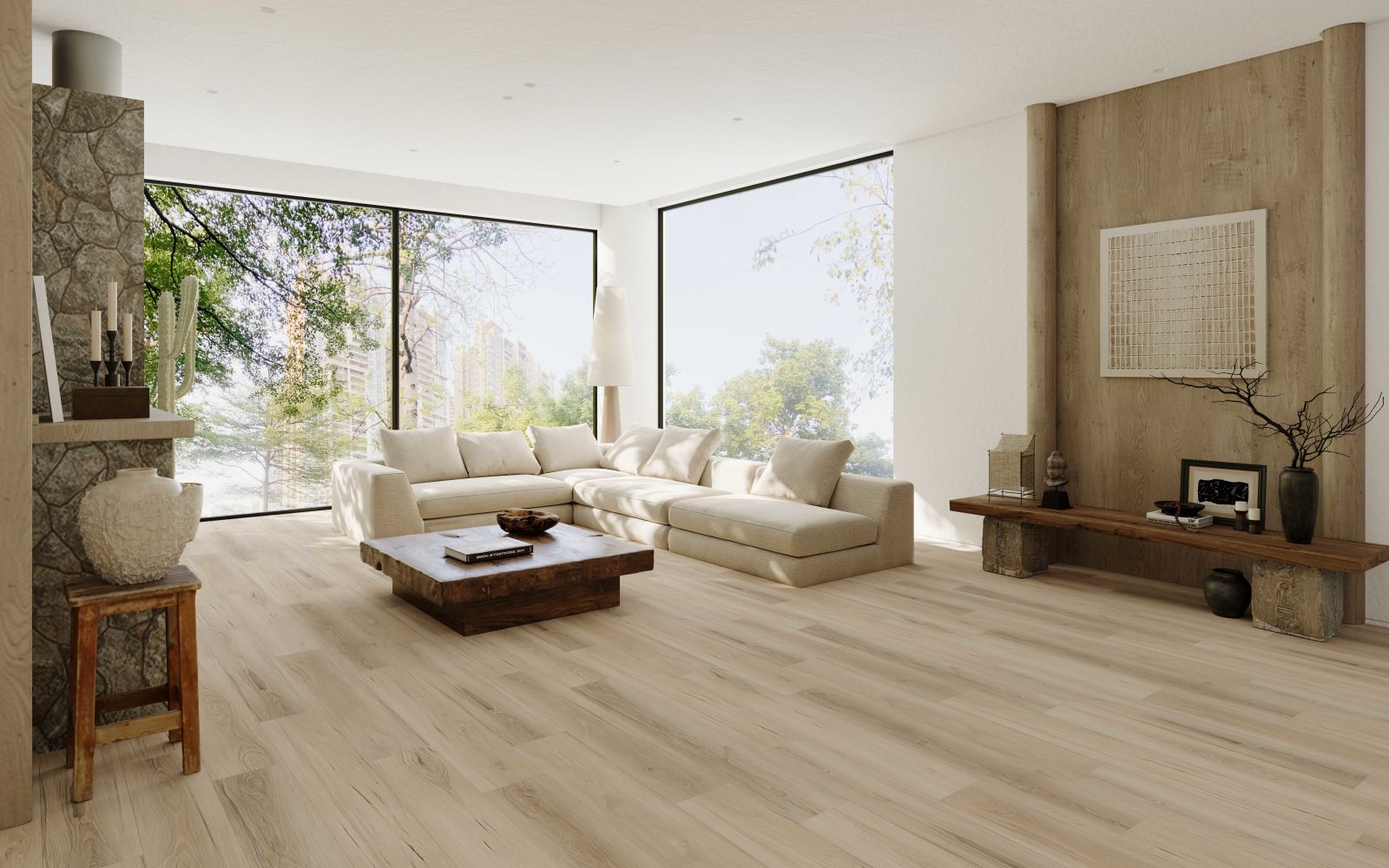Bright living room with a beige sectional sofa, wooden coffee table, and floor-to-ceiling windows showing greenery outside.
