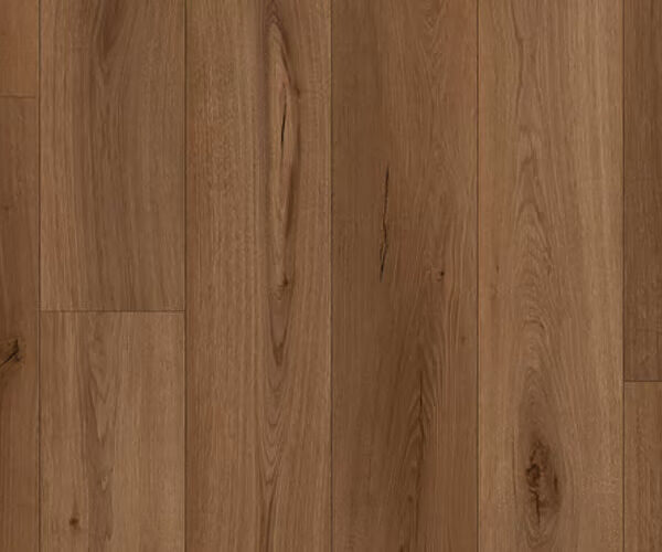 Close-up of warm brown hardwood floor with visible wood grain and knots in the planks