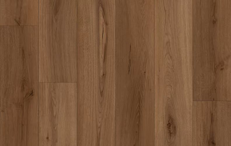 Close-up of warm brown hardwood floor with visible wood grain and knots in the planks