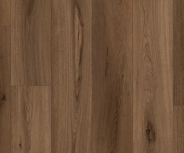 Wooden plank floor with warm brown tones and visible grain patterns as informative image of flooring surface.
