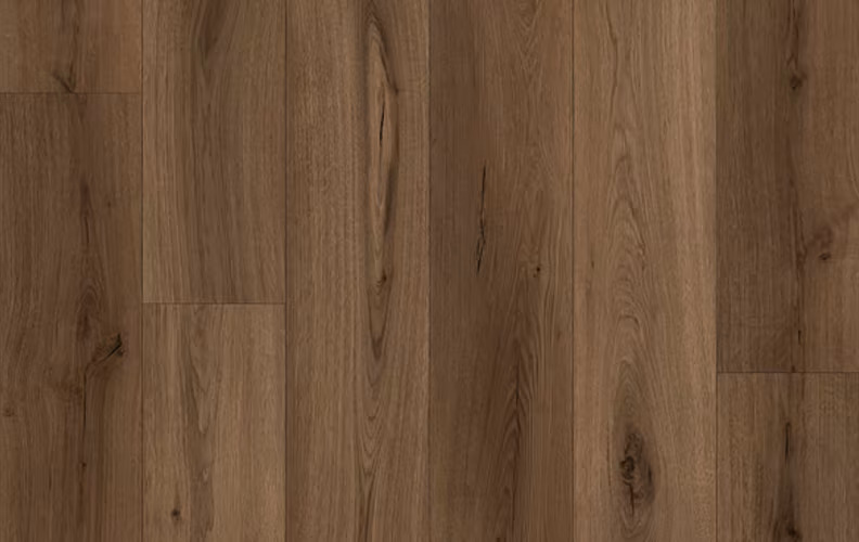Wooden plank floor with warm brown tones and visible grain patterns as informative image of flooring surface.