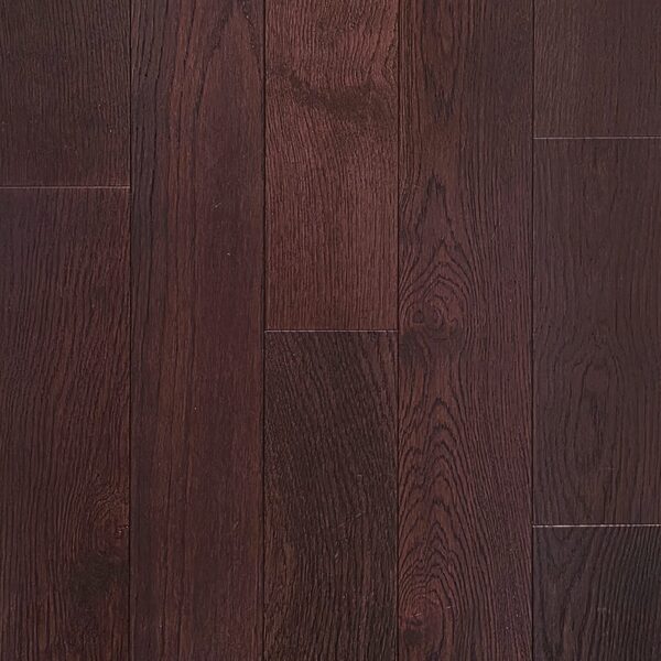 Dark reddish-brown hardwood floor with visible grain and plank seams.