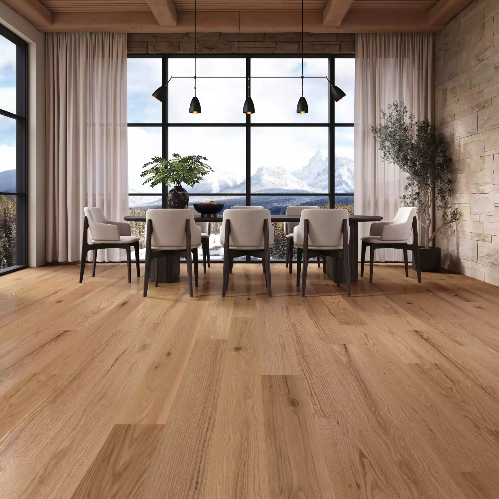 Modern dining room with large windows showing a snowy mountain landscape, cream chairs, and a wooden floor.