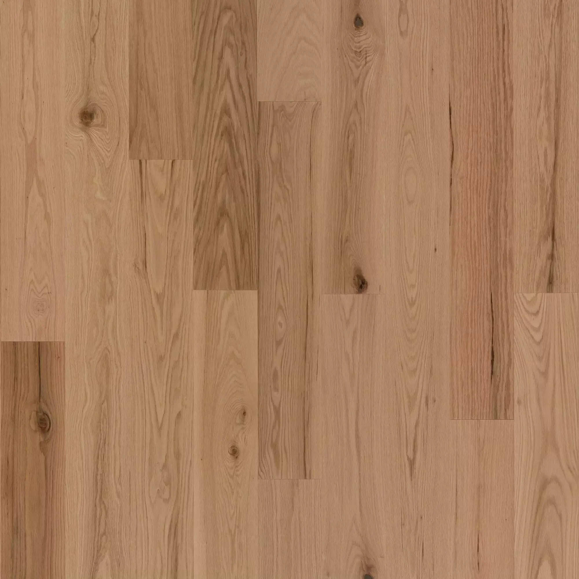 Light brown wooden floor with visible grain and knots in staggered planks.